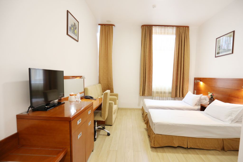 Двухместный номер с 2 отдельными кроватями бизнес