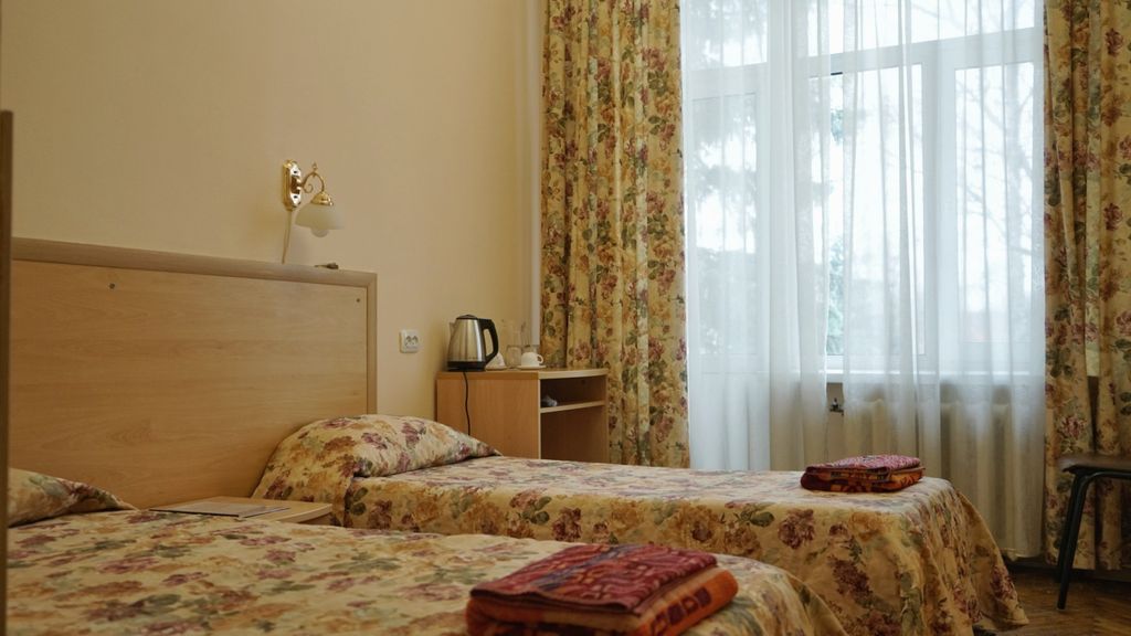 Двухместный номер с 2 отдельными кроватями улучшенный