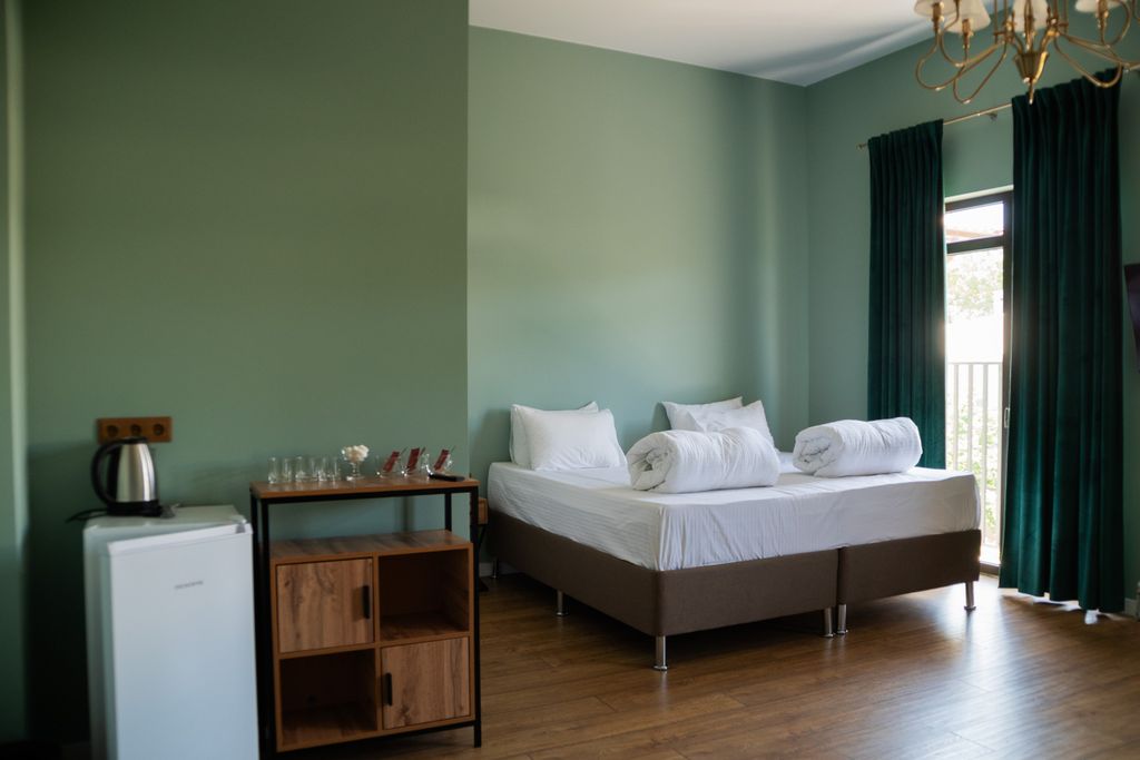 Трёхместный номер Трехместный улучшенный номер с балконом