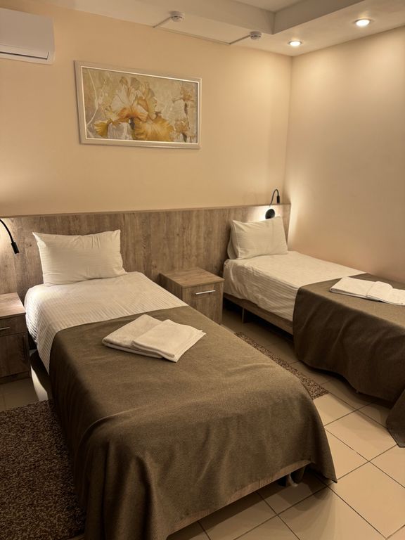 Двухместный номер с 2 отдельными кроватями улучшенный