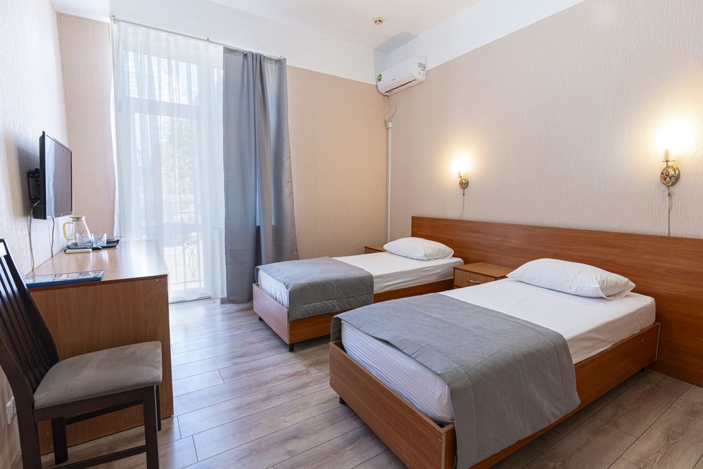 Двухместный номер с 2 отдельными кроватями стандарт с видом на город