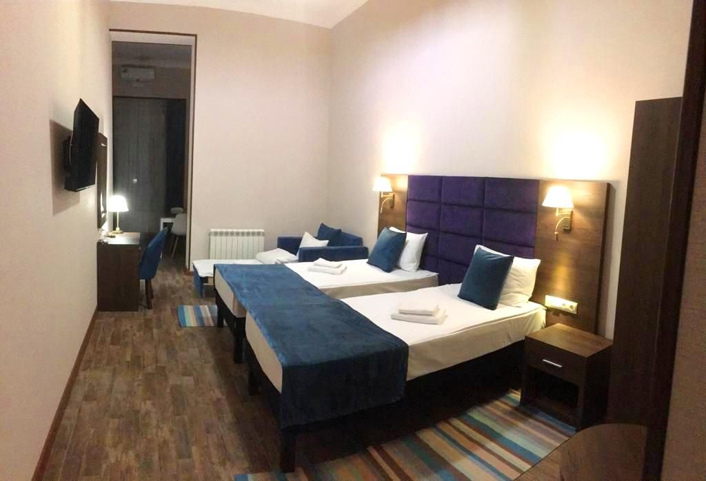 Трёхместный номер с раздельными кроватями и кухней