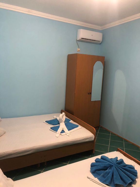 Трёхместный номер номер с балконом и видом на море