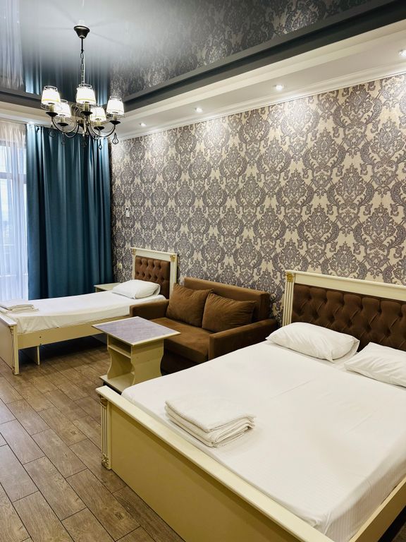 Трёхместный номер улучшенный с видом на море