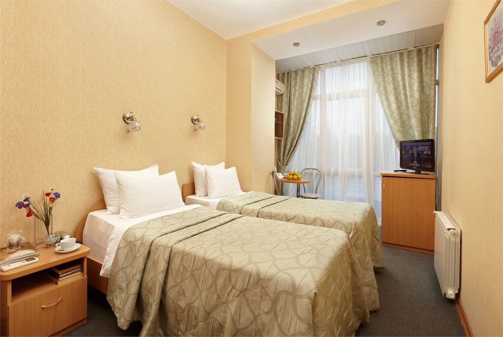 Двухместный номер с 2 отдельными кроватями стандарт