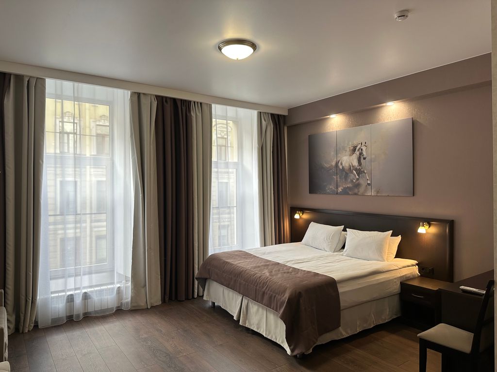 Трёхместный номер делюкс