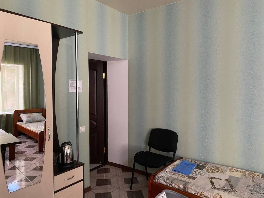 Многоместный смешанный номер с 5 отдельными кроватями