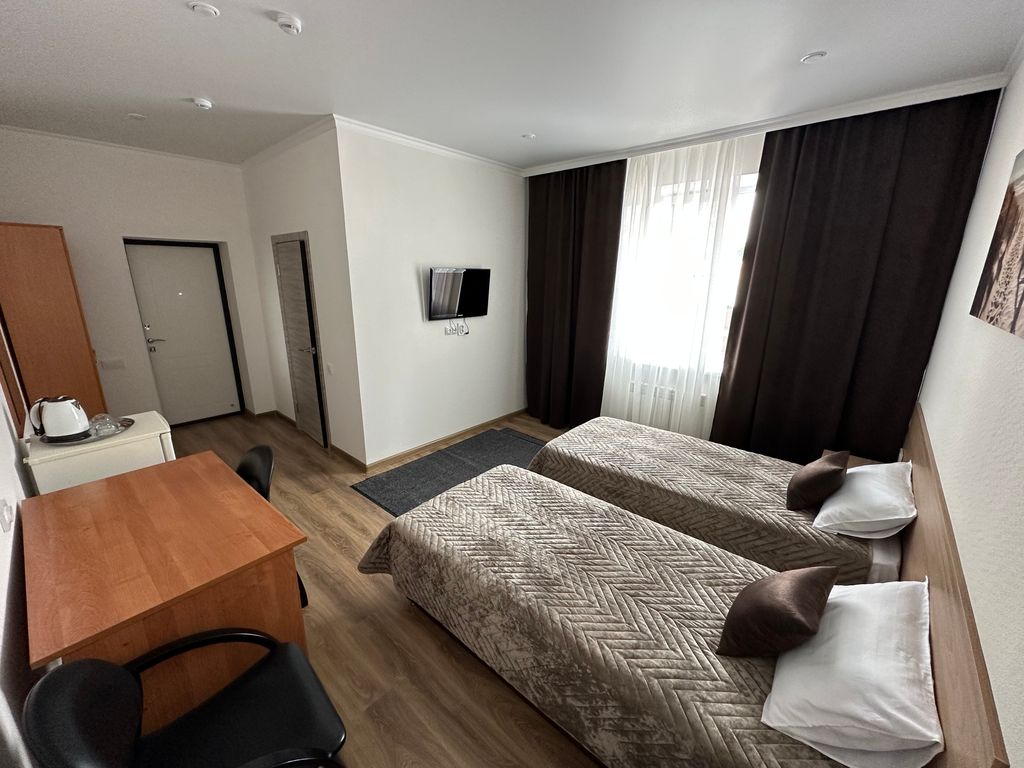 Двухместный номер с 2 отдельными кроватями улучшенный