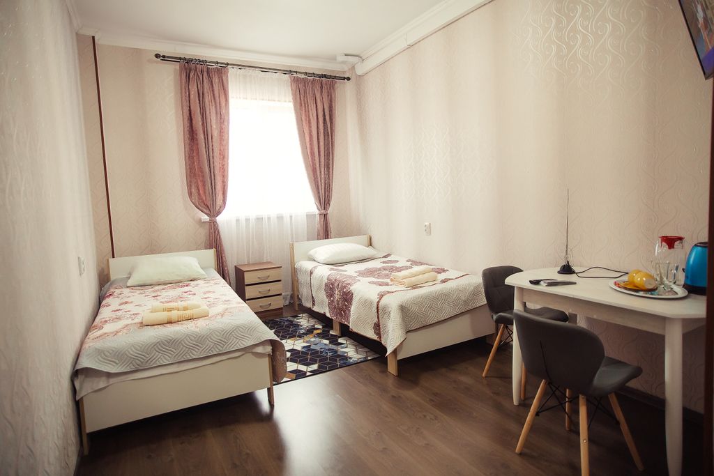 Двухместный номер с 2 отдельными кроватями стандарт