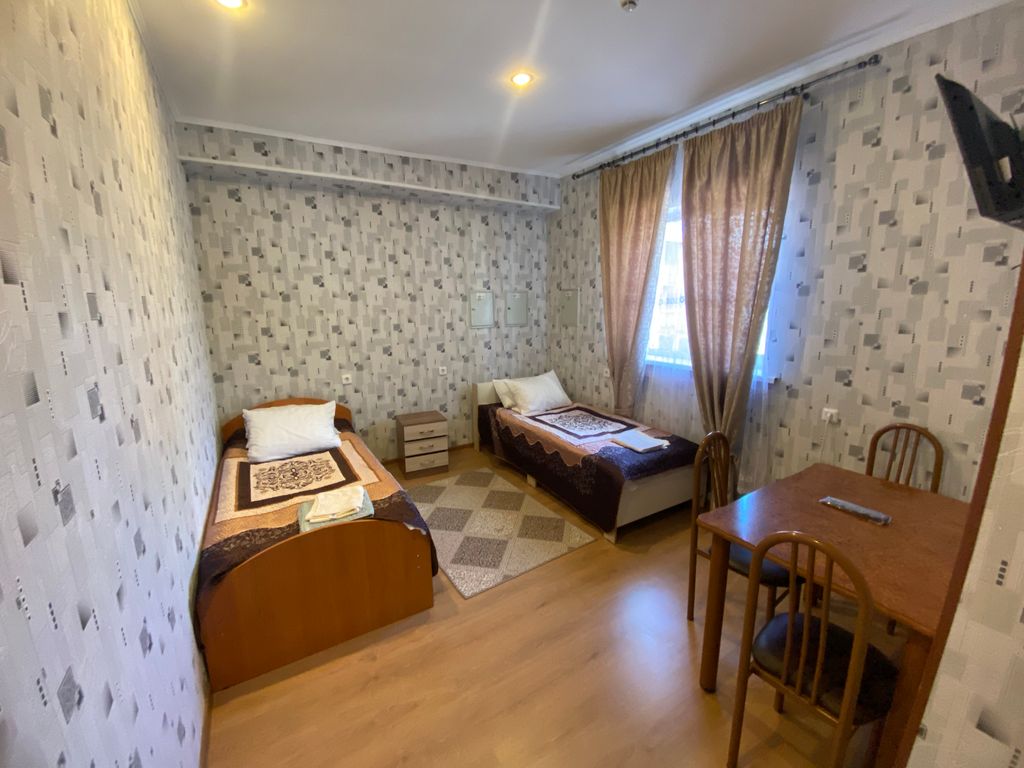 Двухместный номер с 2 отдельными кроватями эконом