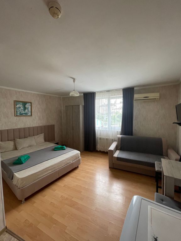 Трёхместный номер с двумя или тремя кроватями