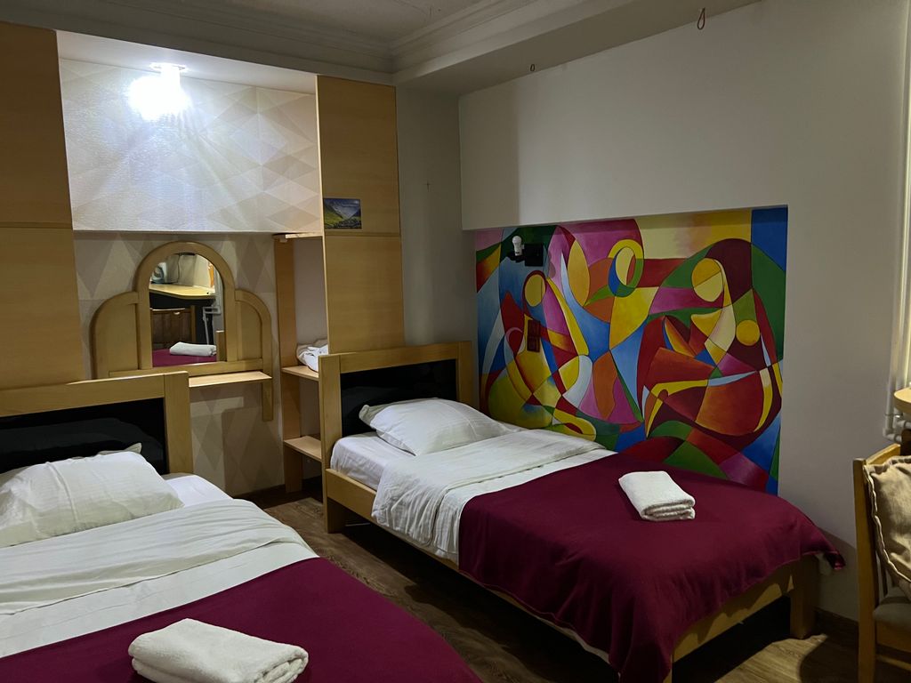 Двухместный номер с 2 отдельными кроватями стандарт