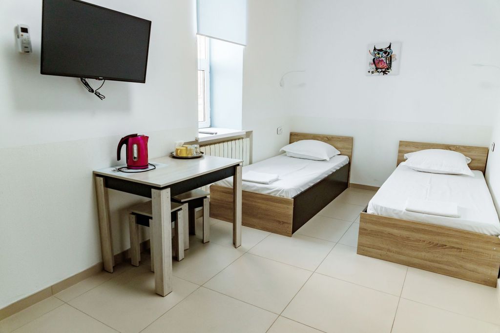 Двухместный номер с 2 отдельными кроватями улучшенный с раздельными кроватями