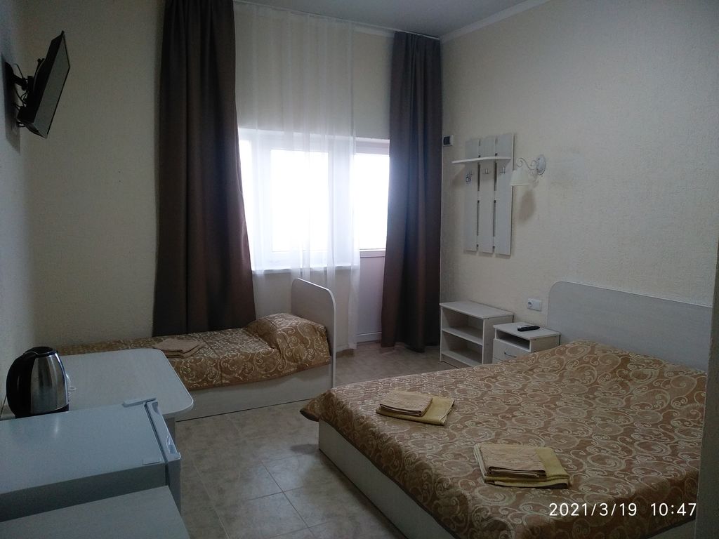 Трёхместный номер улучшенный с видом на море