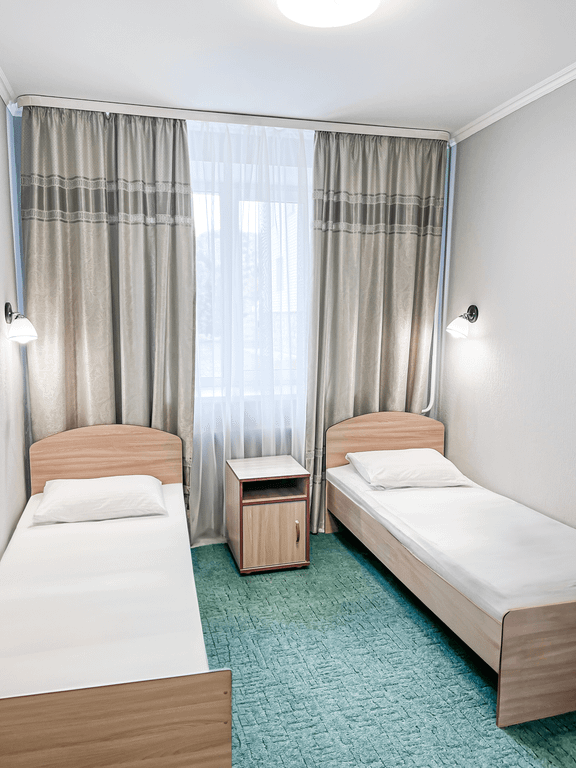 Двухместный номер с 2 отдельными кроватями улучшенный