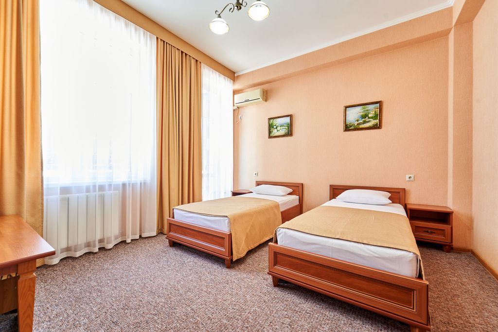 Двухместный номер с 2 отдельными кроватями раздельные