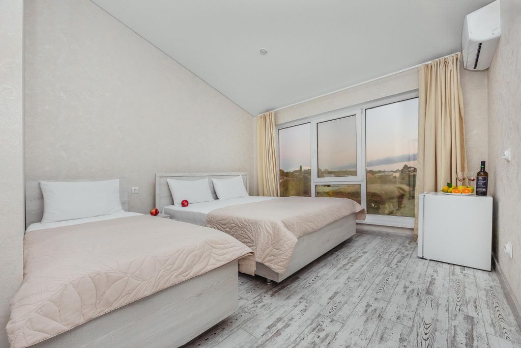 Трёхместный номер делюкс