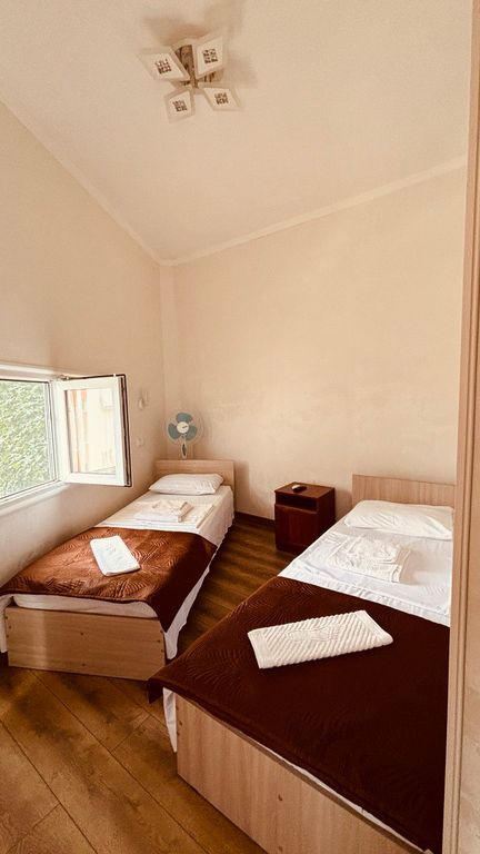 Двухместный номер с 2 отдельными кроватями улучшенный