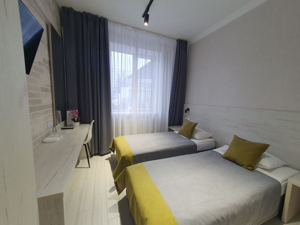 Двухместный номер с 2 отдельными кроватями улучшенный