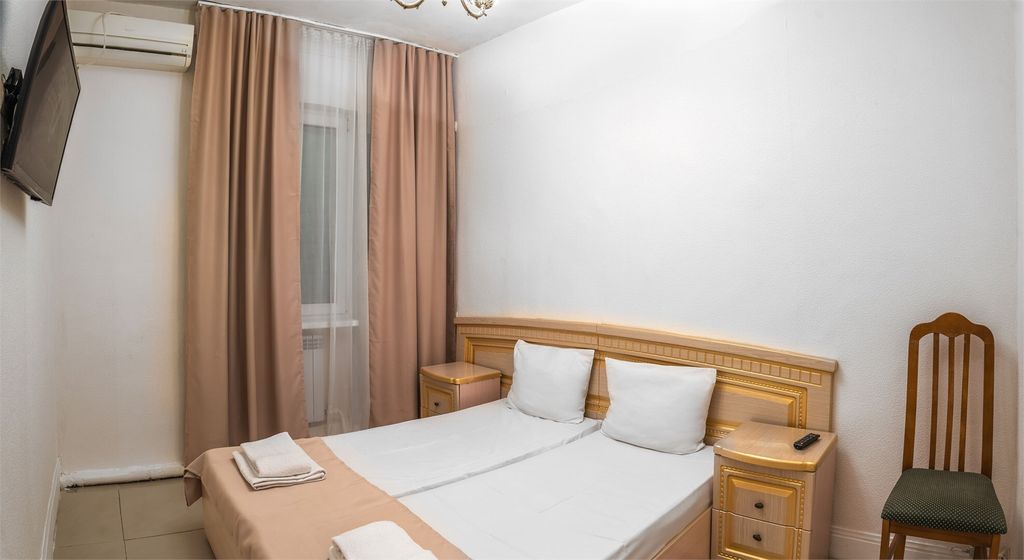 Двухместный номер с 2 отдельными кроватями Бюджет плюс, глухой балкон