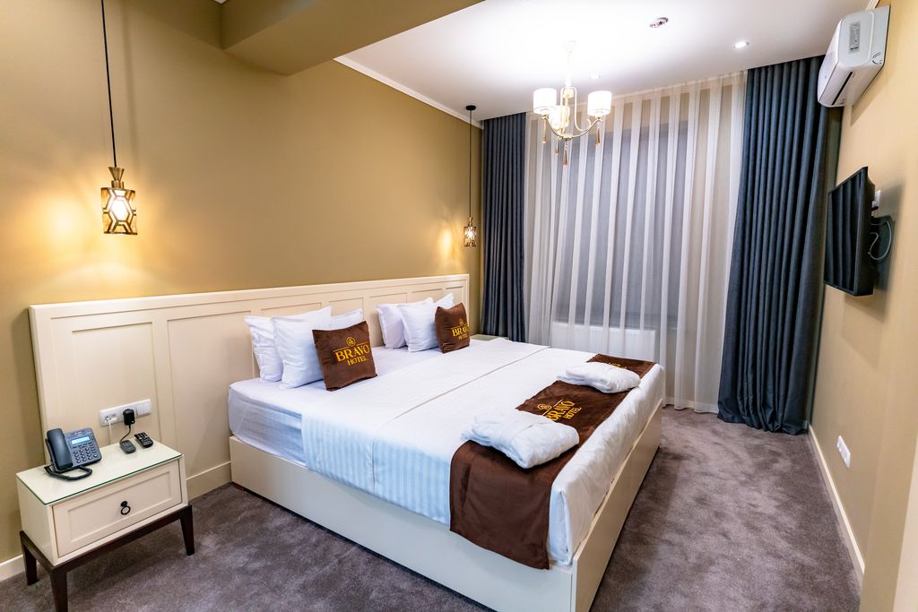 Двухместный номер с 1 кроватью или с двумя раздельными Люкс