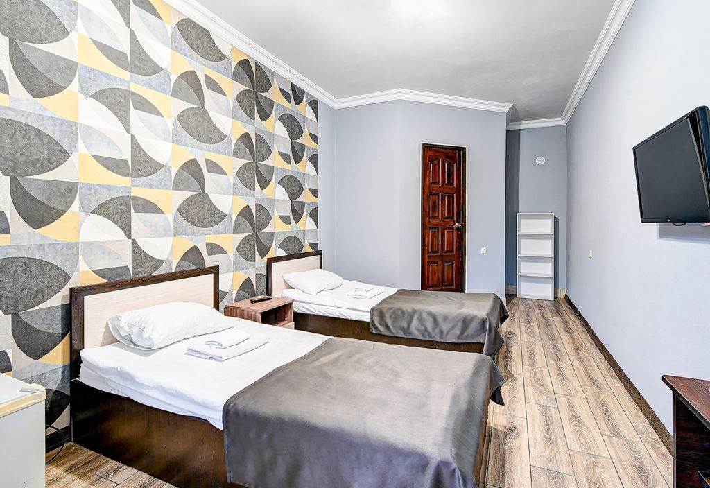 Двухместный номер с 2 отдельными кроватями стандарт