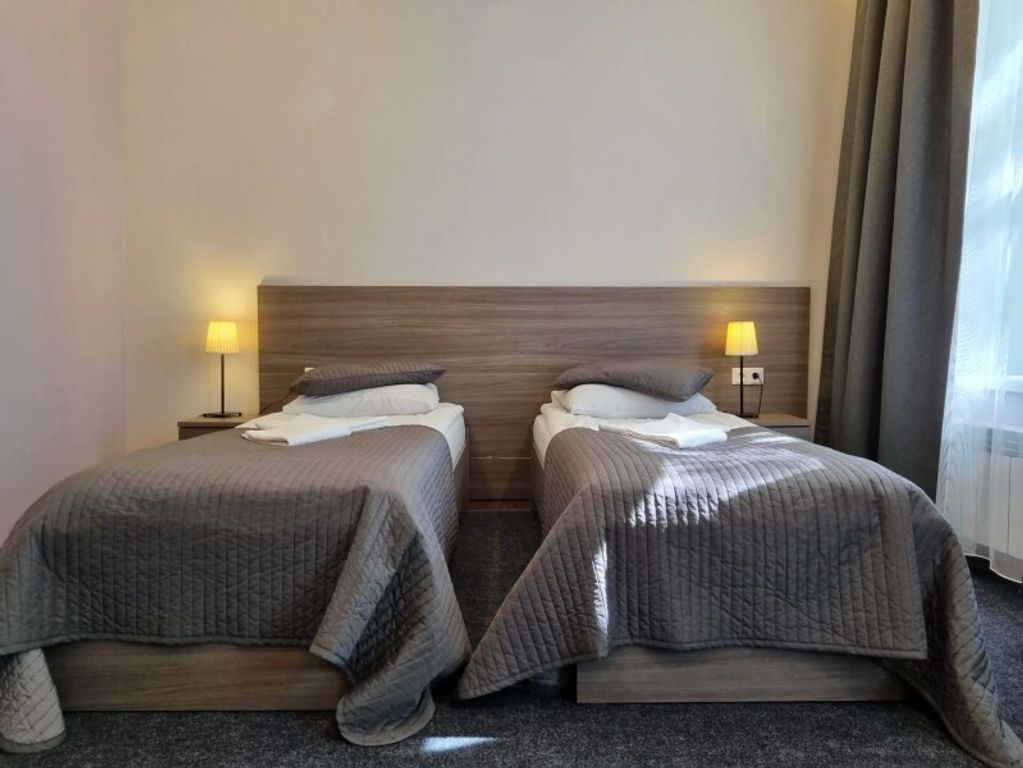 Двухместный номер с 2 отдельными кроватями стандарт