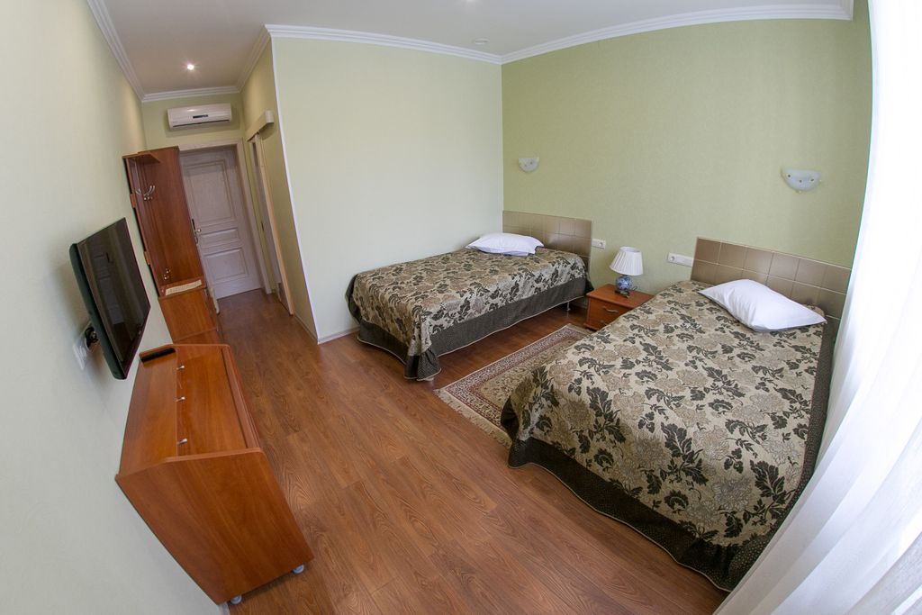 Двухместный номер с 2 отдельными кроватями Стандарт