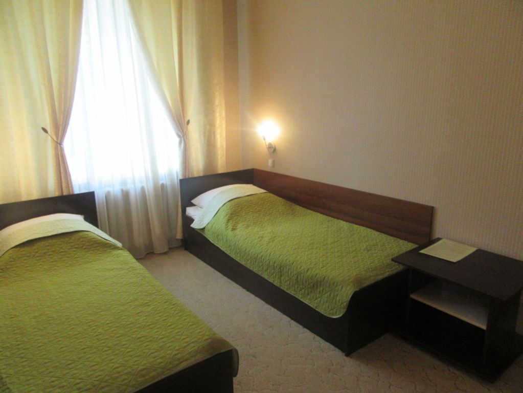 Двухместный номер с 2 отдельными кроватями стандарт