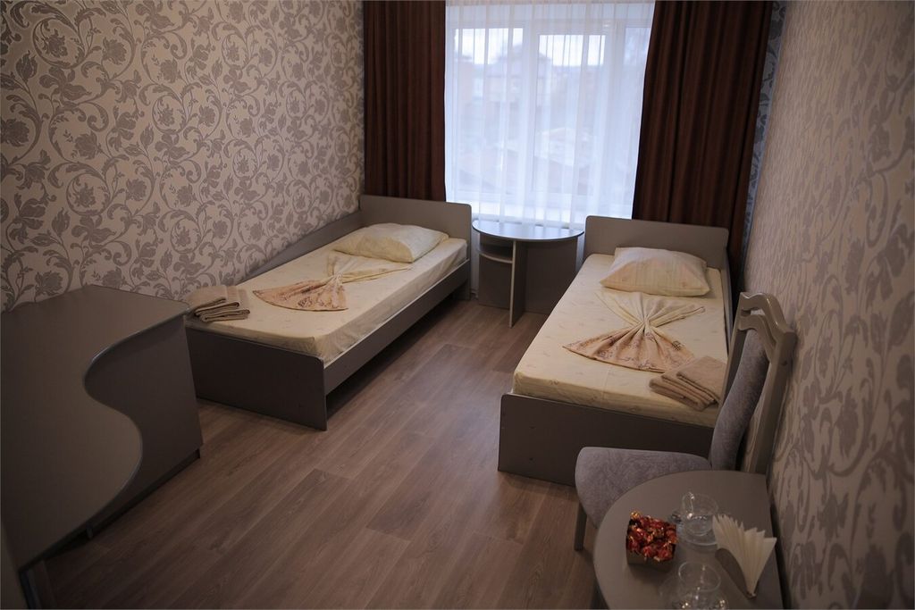 Двухместный номер с 2 отдельными кроватями  улучшенный