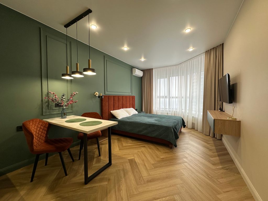 Апартаменты студия с видом на город