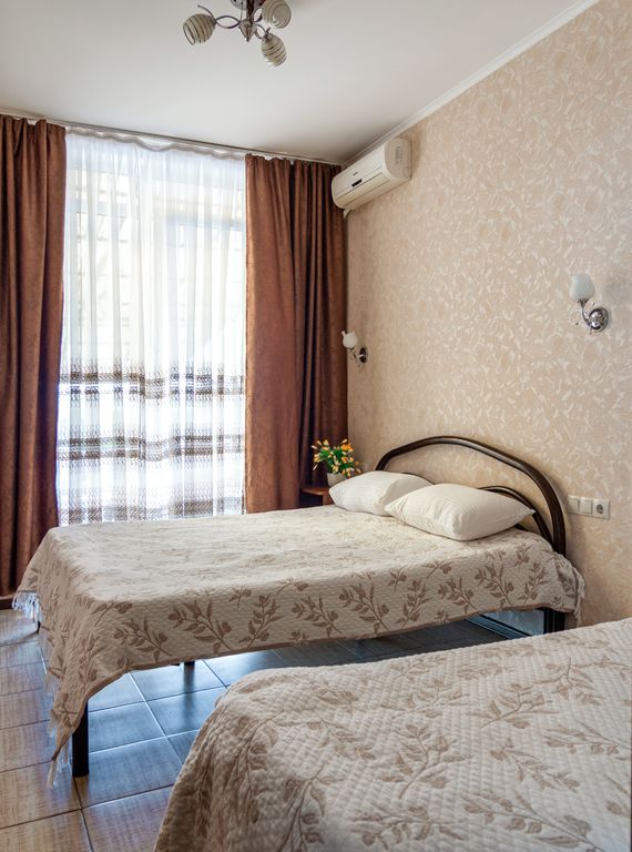 Семейный номер 2-комнатный с кухней и полным санузлом на 2 номера