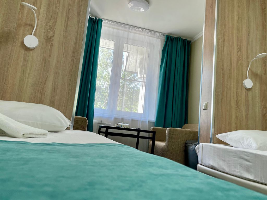 Двухместный номер с 2 отдельными кроватями полулюкс