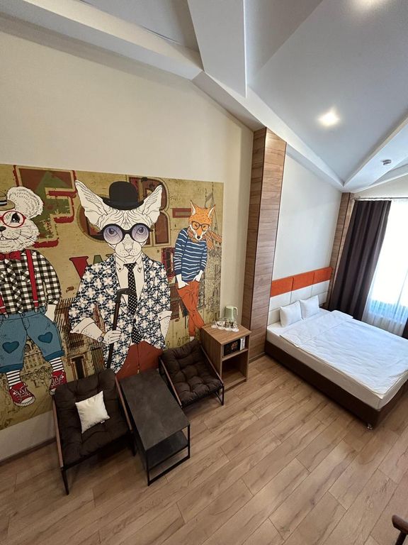 Четырёхместный номер двухуровневые апартаменты 302