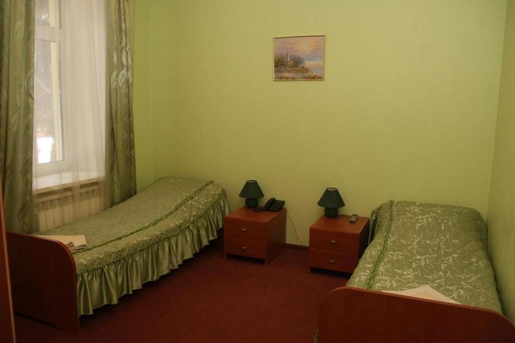 Двухместный номер с 2 отдельными кроватями Эконом