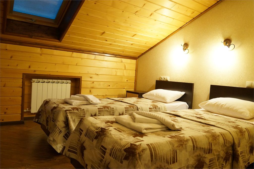 Двухместный номер с 2 отдельными кроватями мансардный стандарт