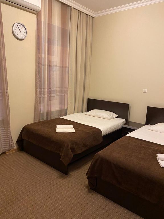 Двухместный номер с 2 отдельными кроватями Двухместный номер с двумя отдельными кроватями