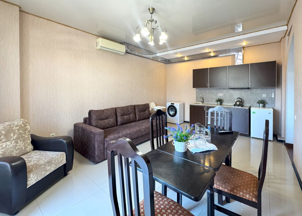 Апартаменты двухкомнатные с кухней и большой террасой (1 этаж)