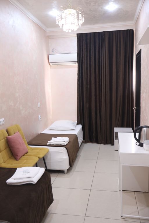 Двухместный номер с 2 отдельными кроватями улучшенный