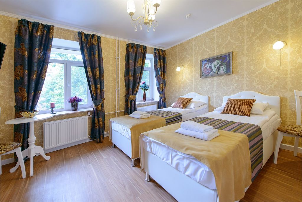 Двухместный номер с 2 отдельными кроватями или одной двуспальной улучшенный