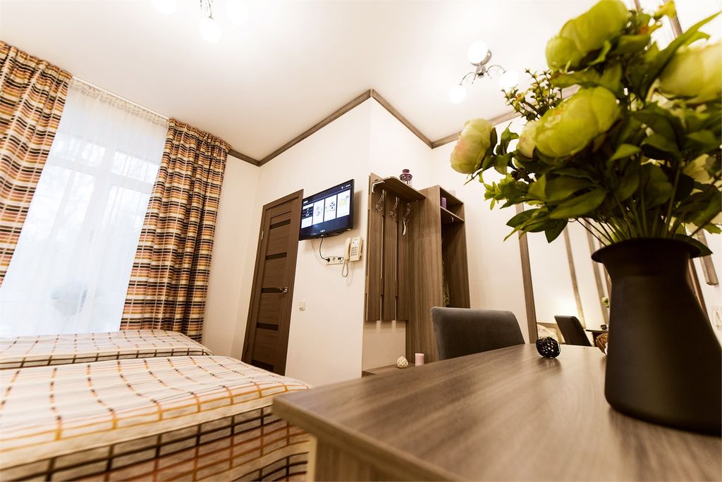 Двухместный номер с 2 отдельными кроватями Стандарт в гостинице на берегу с видом на лес