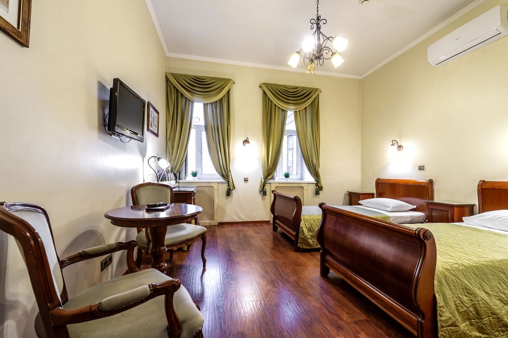 Двухместный номер с 2 отдельными кроватями улучшенный номер