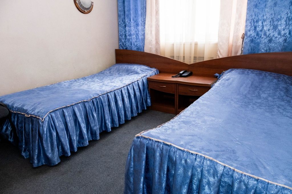 Двухместный номер с 2 отдельными кроватями стандарт