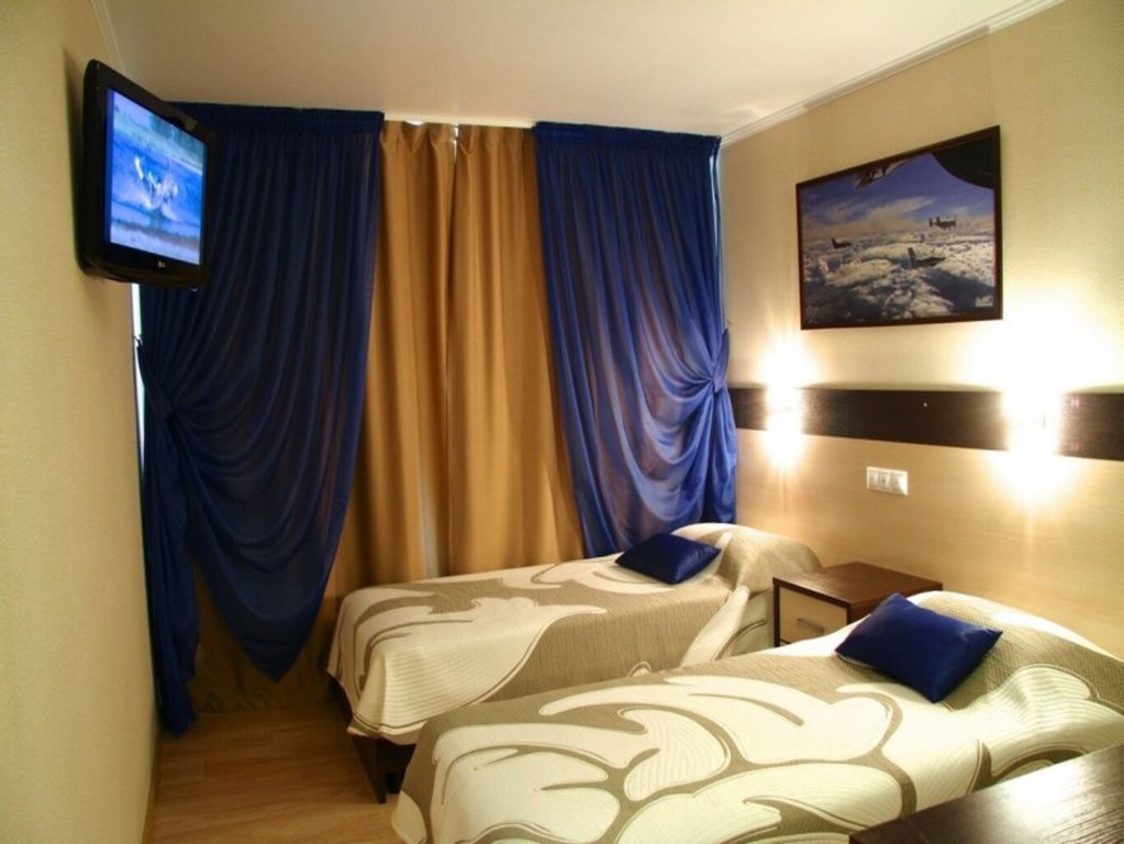 Двухместный номер с 2 отдельными кроватями стандарт улучшенный