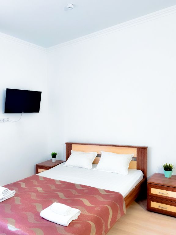 Четырёхместный номер deluxe with balcony