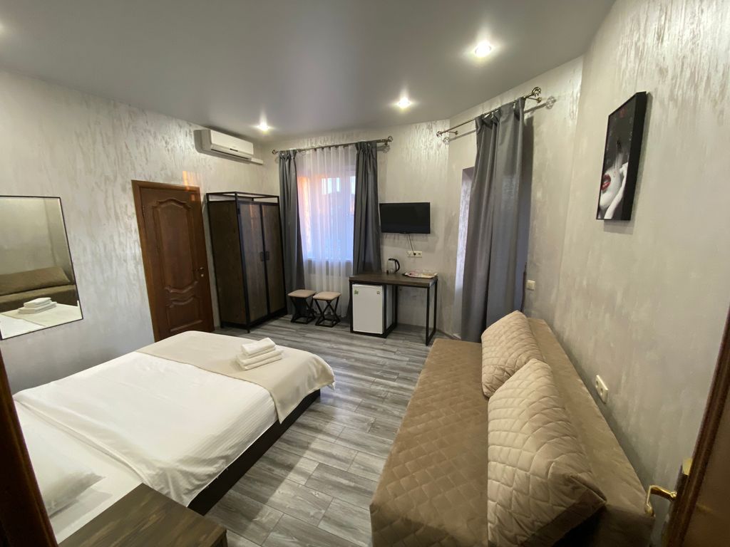 Четырёхместный номер улучшенный 303