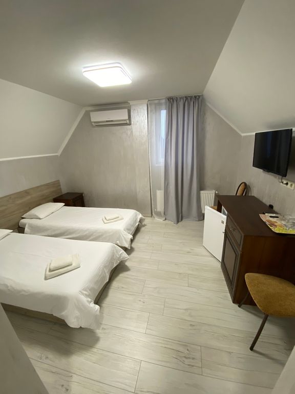 Двухместный номер с 2 отдельными кроватями стандарт 402