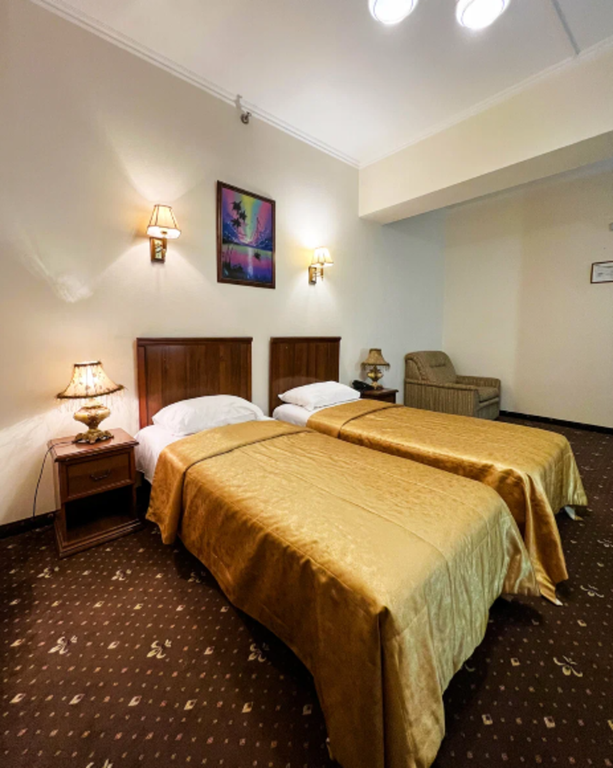 Двухместный номер с 2 отдельными кроватями стандарт