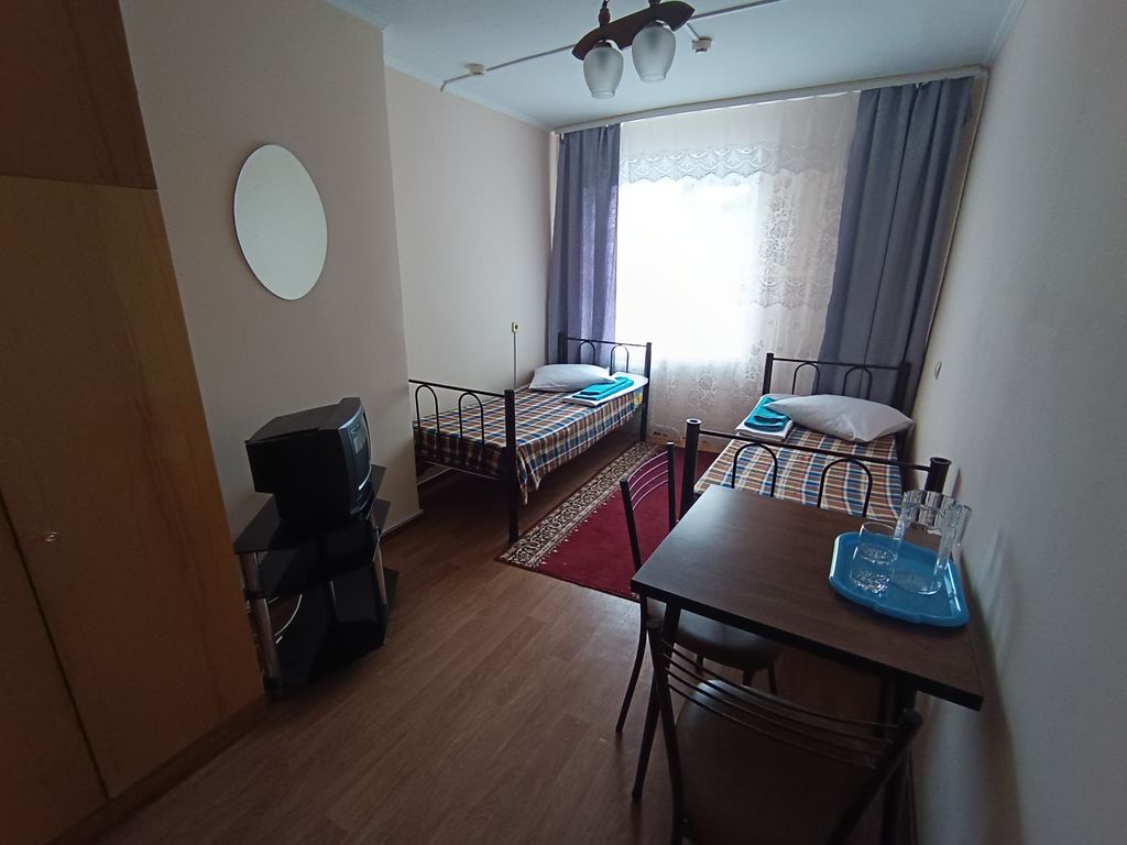 Двухместный номер с 2 отдельными кроватями хостел с двумя одноместными кроватями