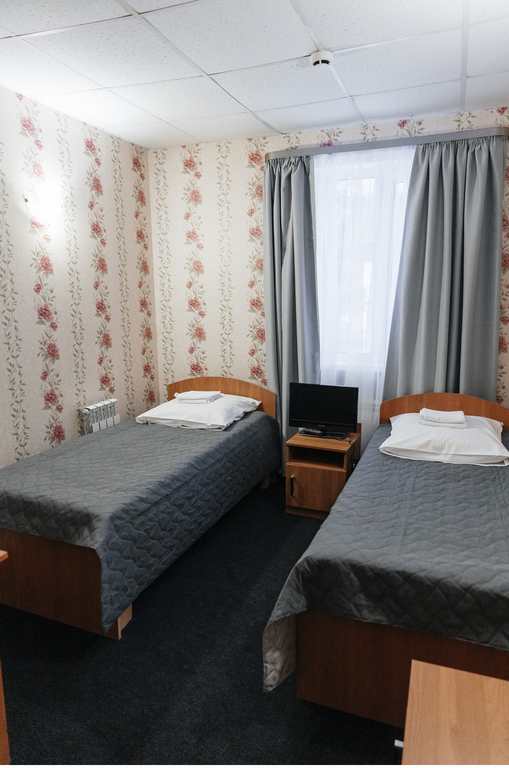 Двухместный номер с 2 отдельными кроватями эконом